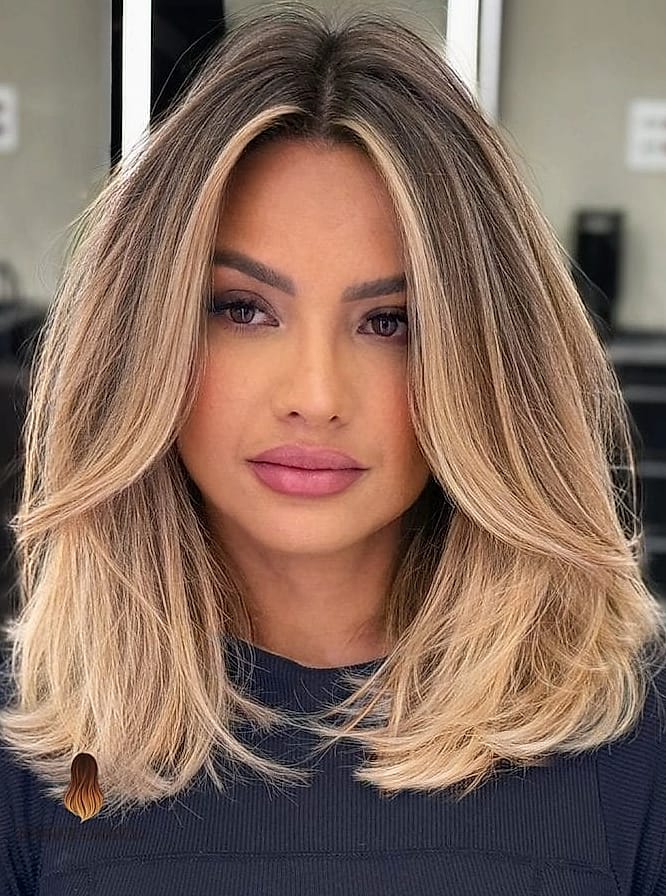 28 Balayage Blonde Looks You'll Want to Screenshot Immediately 24 Bronde Layered Lob with Lived-In Texture