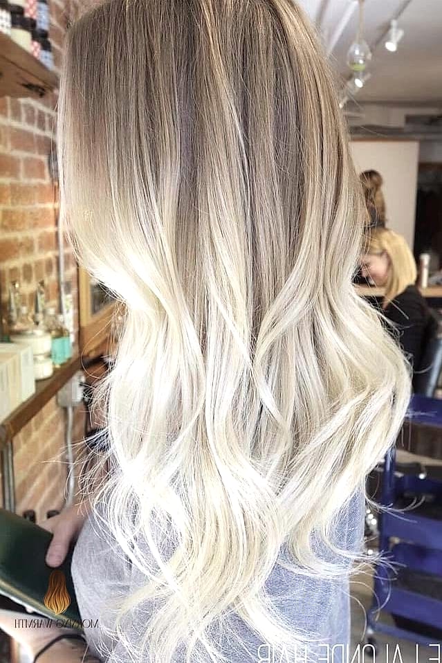 27 Blonde Hair Color Ideas Every Woman Needs to See 24 Charming Blonde Ombre with Beach Waves