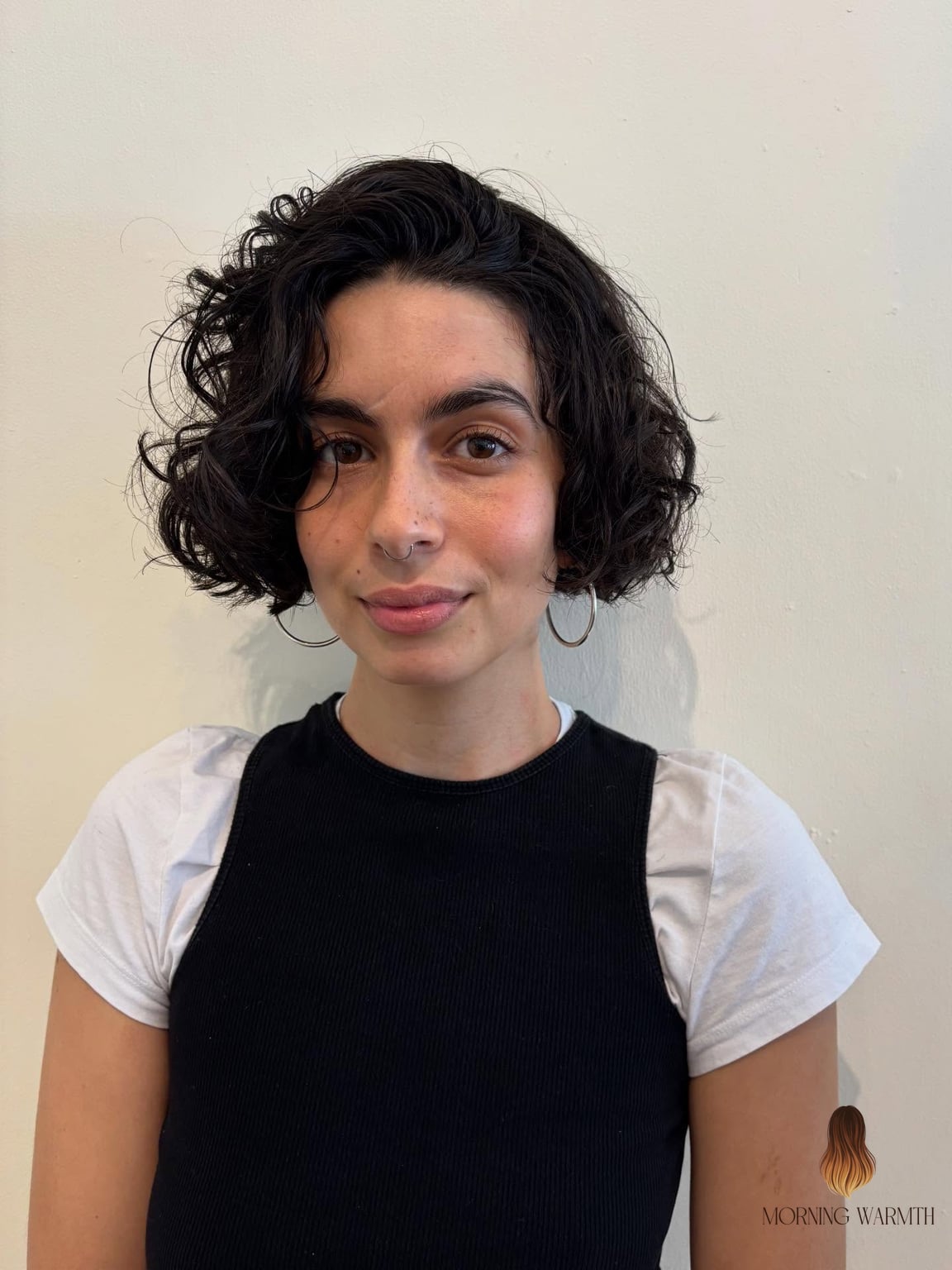 Curly Bob That Hits Right Above the Shoulders