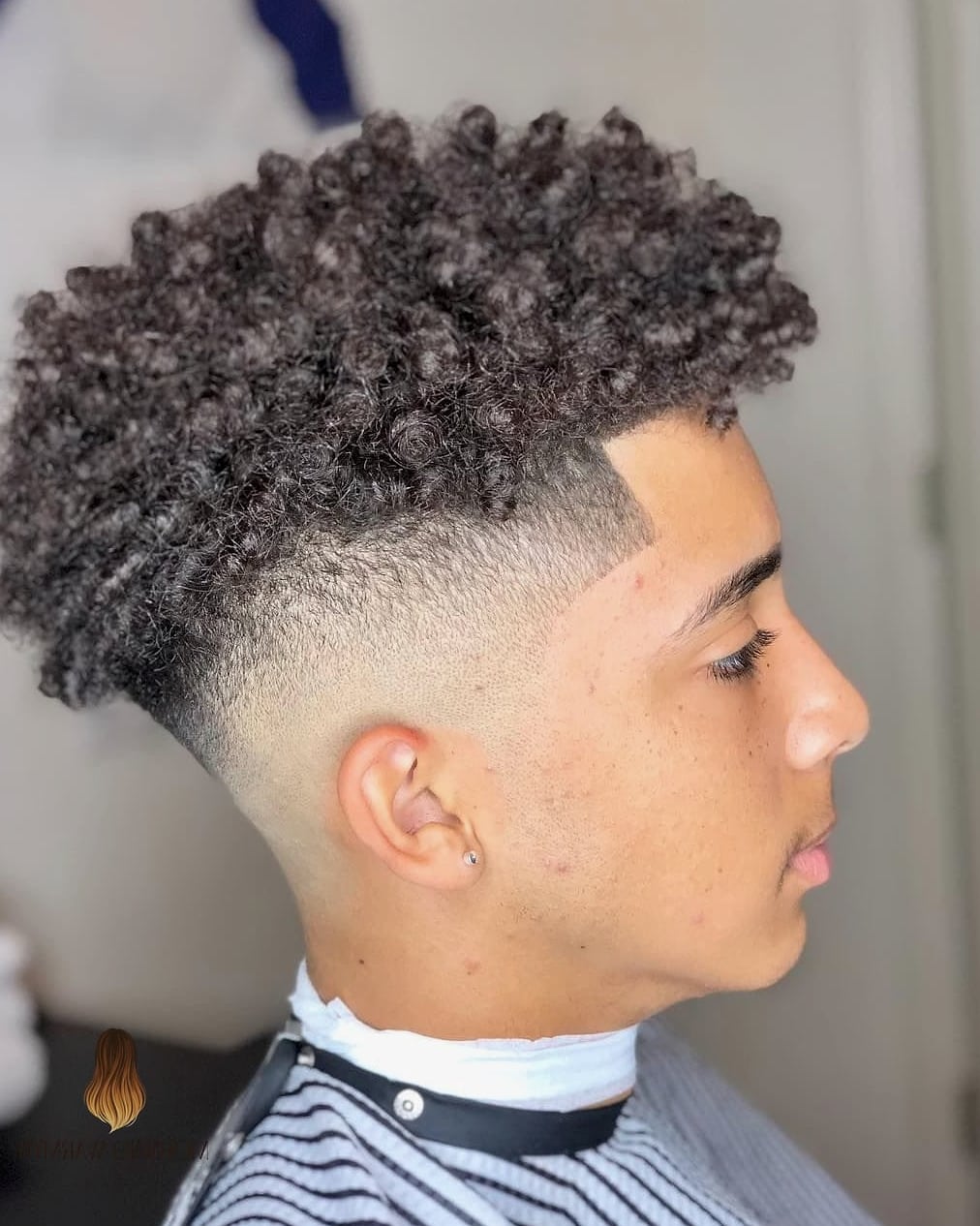 Curly Top with Faded Sides for an Edge