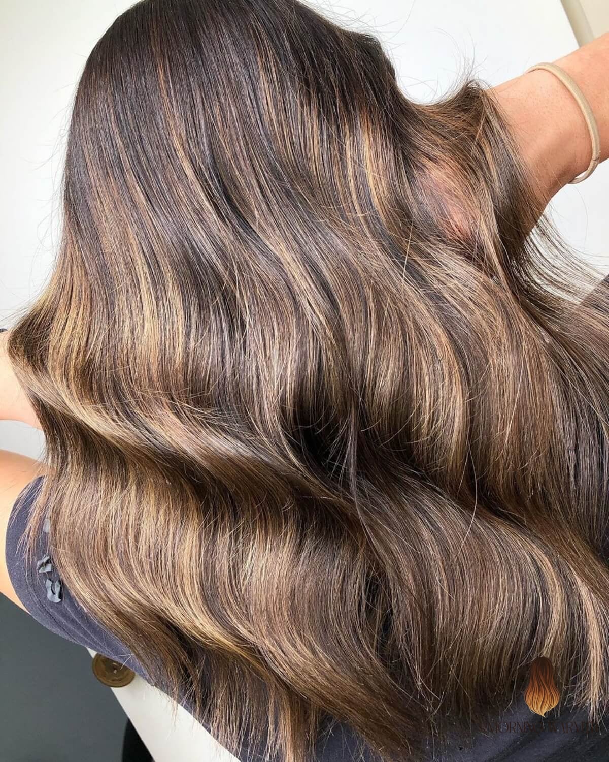30 Dark Caramel Balayage Ideas You Need to Try Next 11 Dark Brown with Light Caramel Streaks on Medium-Length Hair