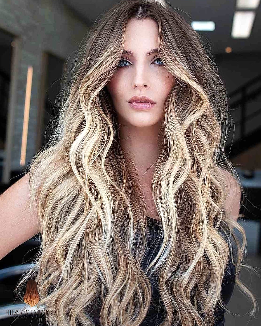 30 Blonde Balayage On Dark Hair Ideas You Need to Try Next 17 Flowing Waves with Sunlit Balayage Blonde and Brown