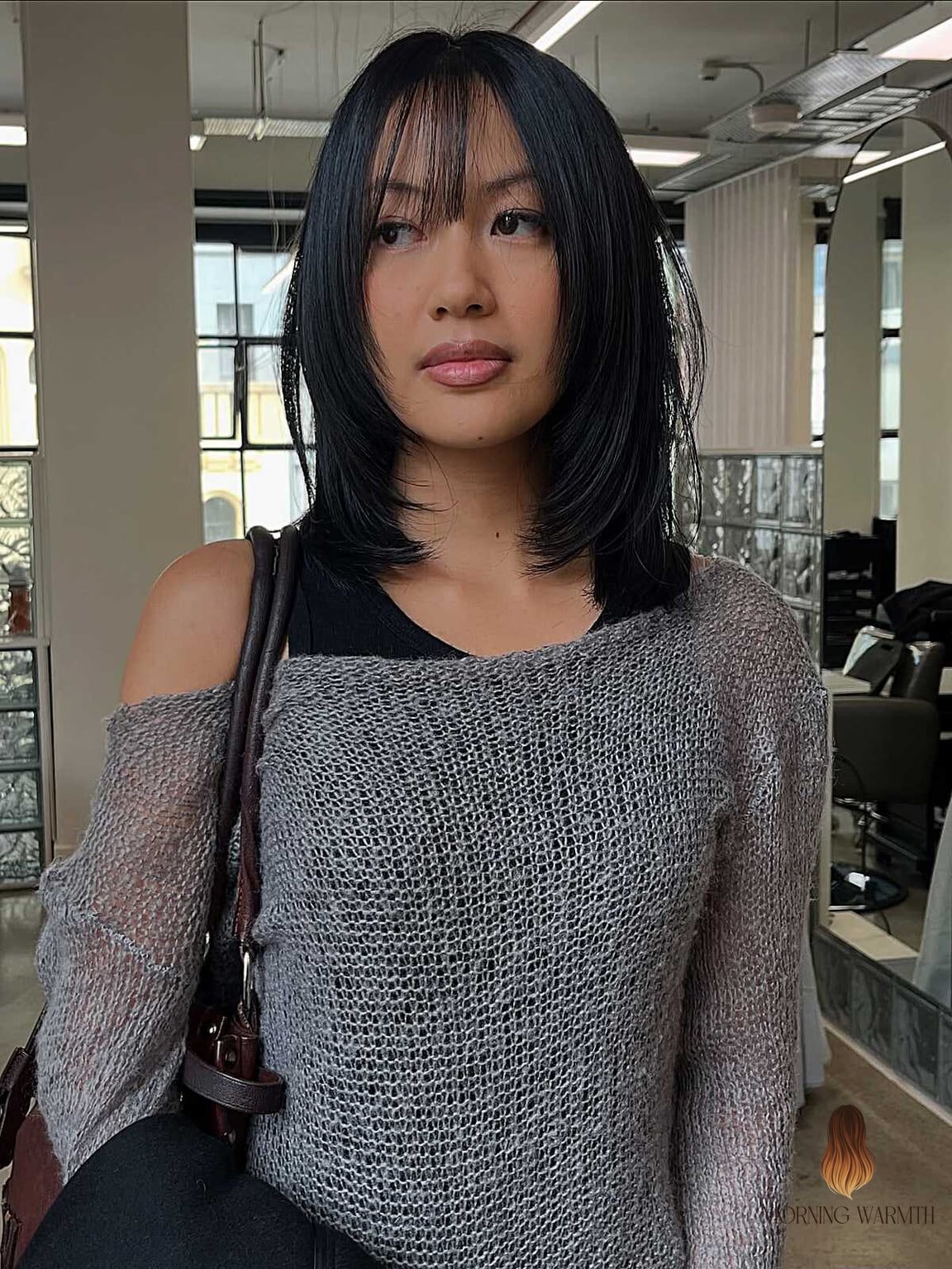 28 Balayage Blonde Looks You'll Want to Screenshot Immediately 19 Ink-Black Layers with Wispy Straight Bangs