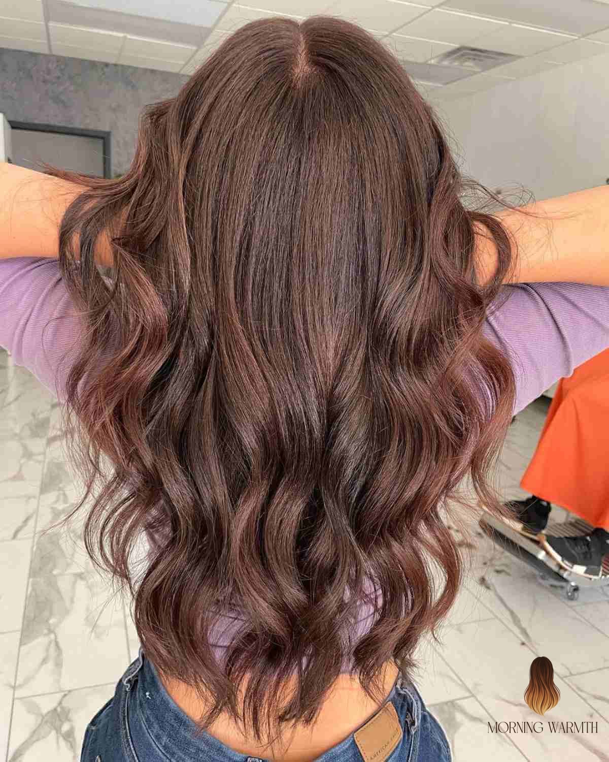 27 Chocolate Hair Color Ideas Every Woman Needs to See 21 Long Chocolate Hair with Bouncy Waves