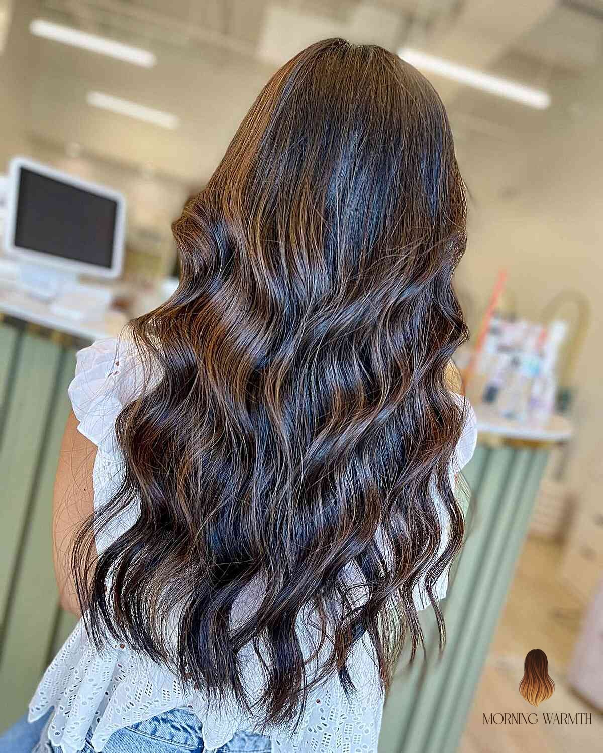 21 Brown Balayage Ideas That Are Trending Right Now 7 Long Wavy Chocolate Swirls