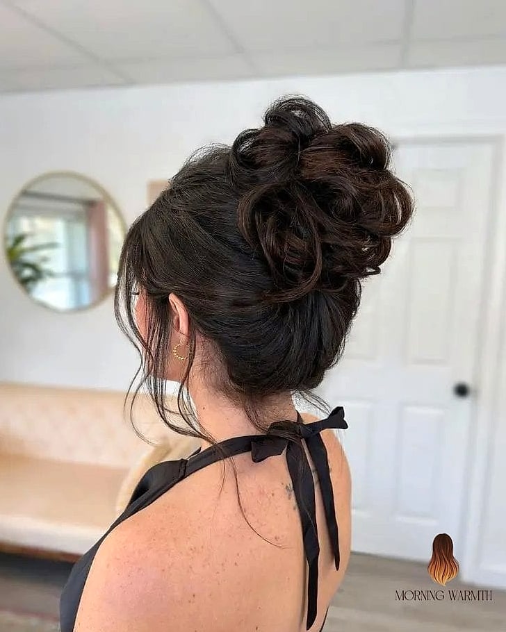 23 Dark Hair Color Ideas Inspo Ideas Worth Pinning Immediately 4 Messy Bun with Volume