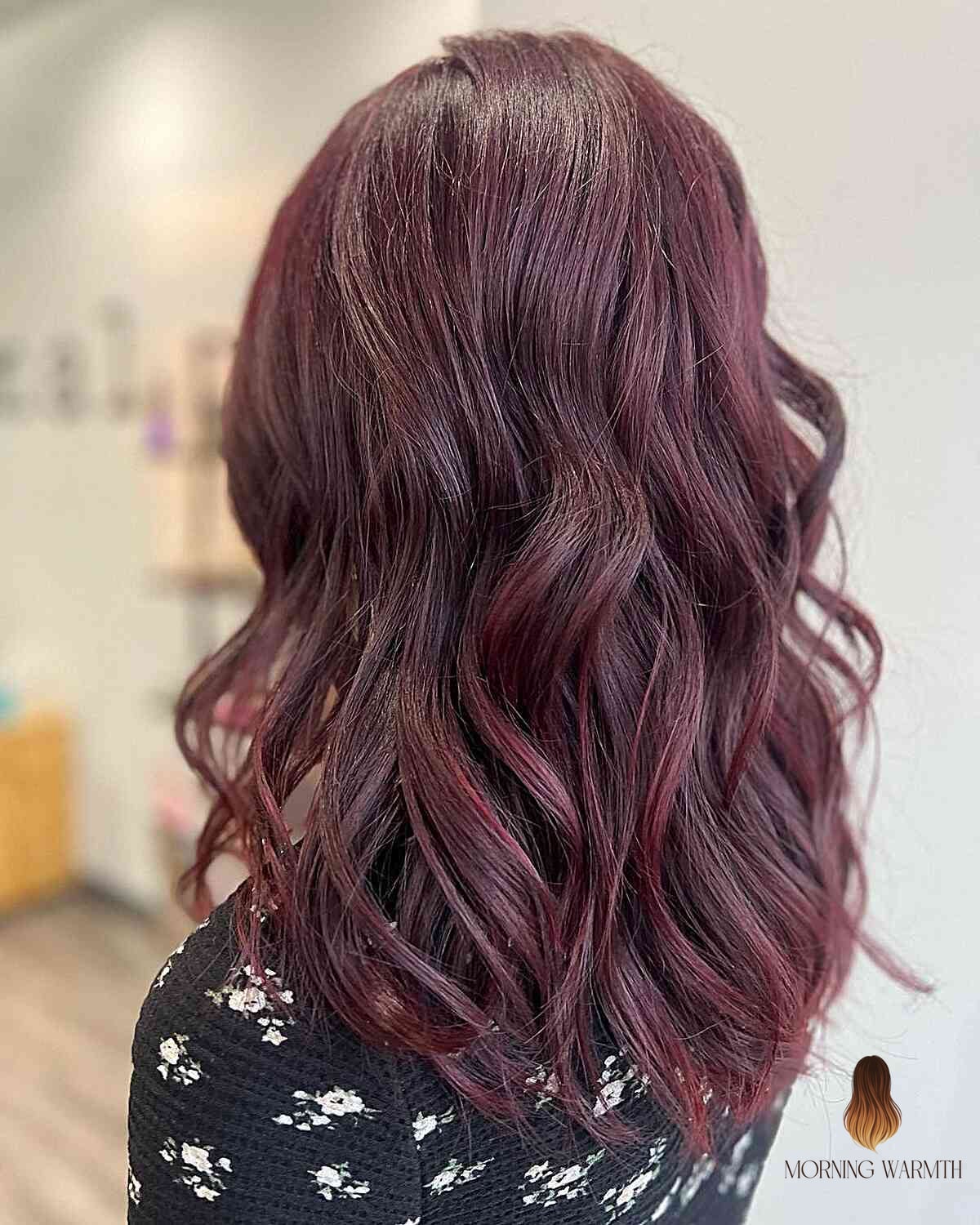 22 Burgundy Hair Color Ideas Worth Bookmarking Right Now 2 Muted Burgundy Red Hair with Soft Waves