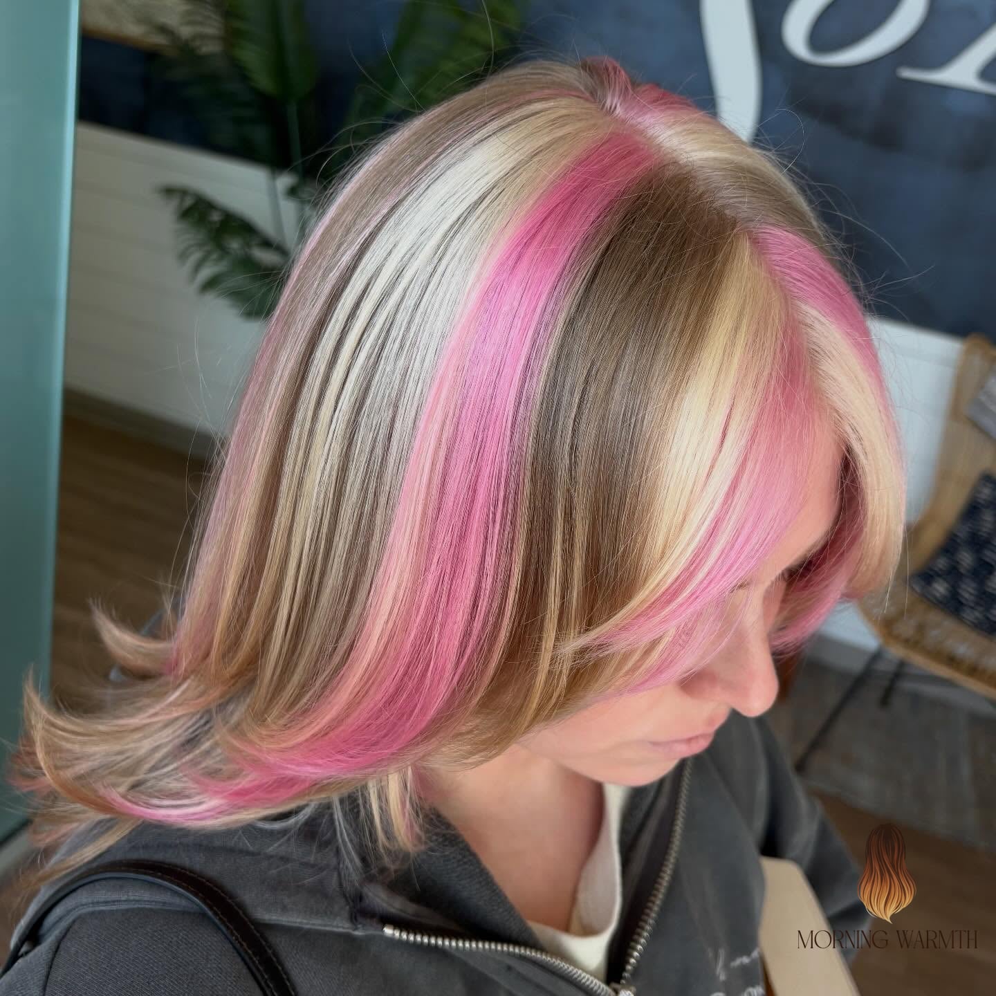 Playful Layered Cut with Soft Pink Highlights