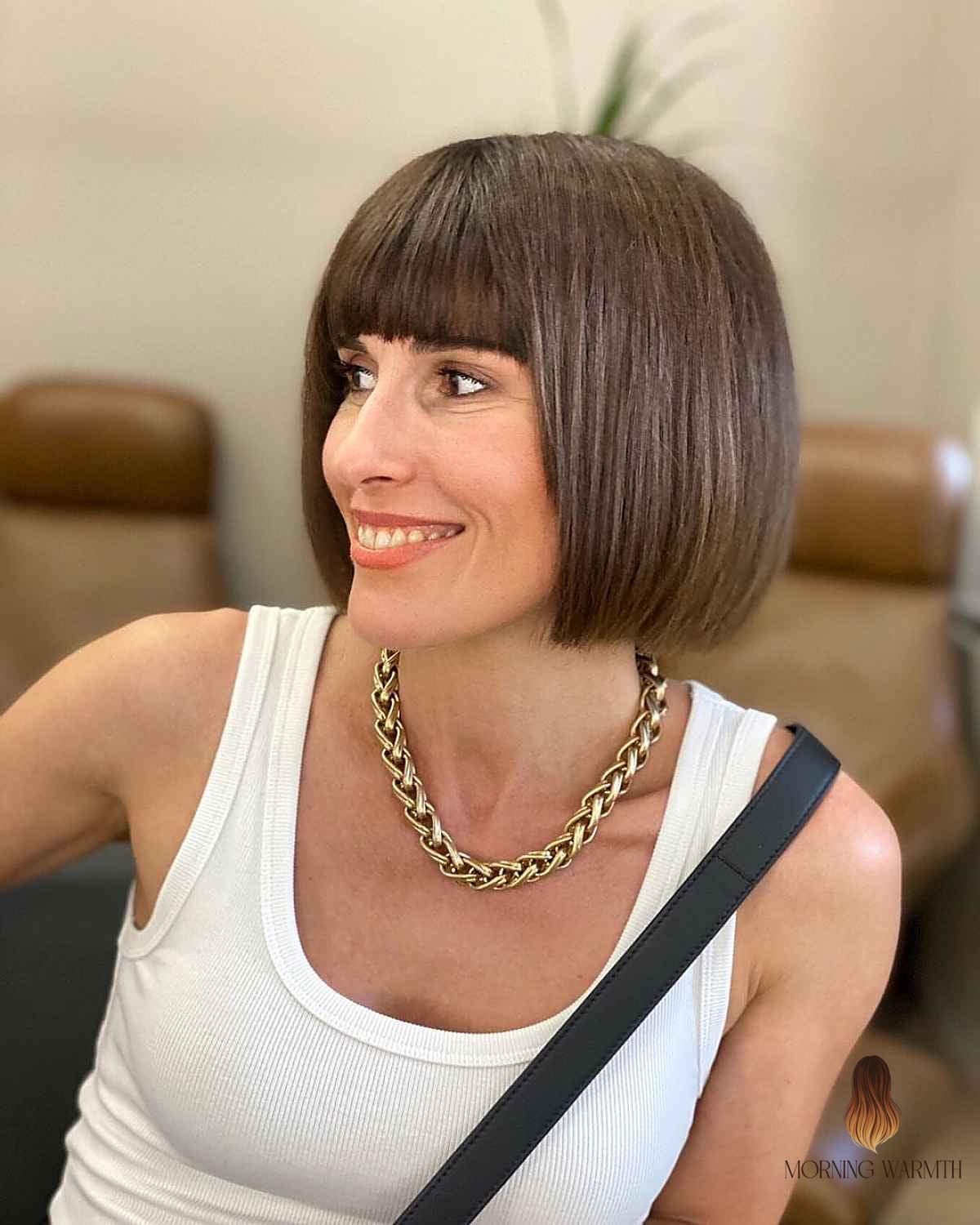 20 Mushroom Brown Hair Color Ideas That Are Breathtakingly Beautiful 8 Short Brown Bob with Bangs Haircut