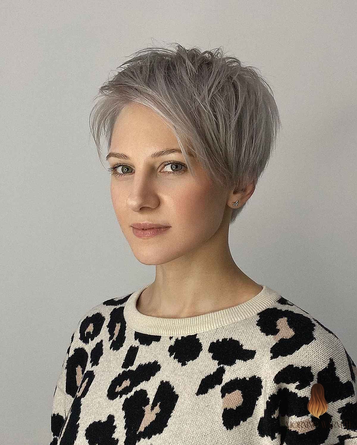 20 Blonde Hair Color Ideas Ideas That Will Make You Book Your Appointment Immediately 17 Silver Blonde Pixie Cut with Long Side-Swept Fringe