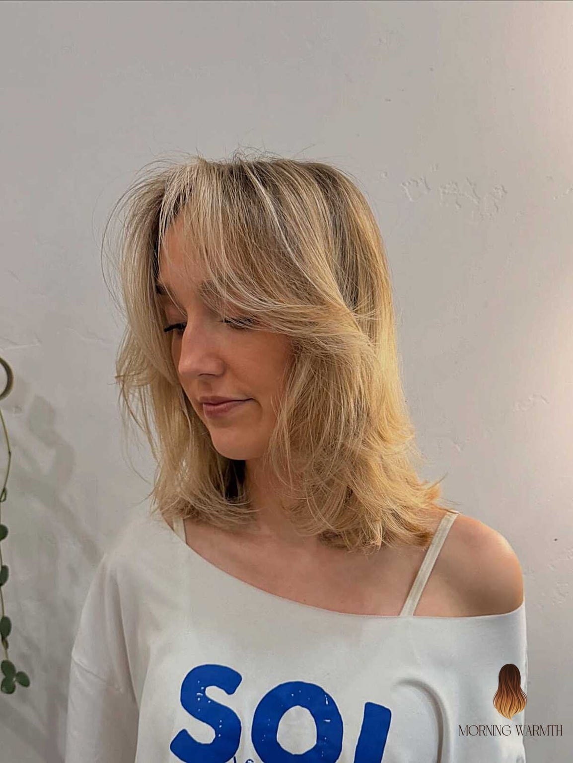 28 Balayage Blonde Looks You'll Want to Screenshot Immediately 9 Sun-Bleached Blonde with Feathered 90s Layers
