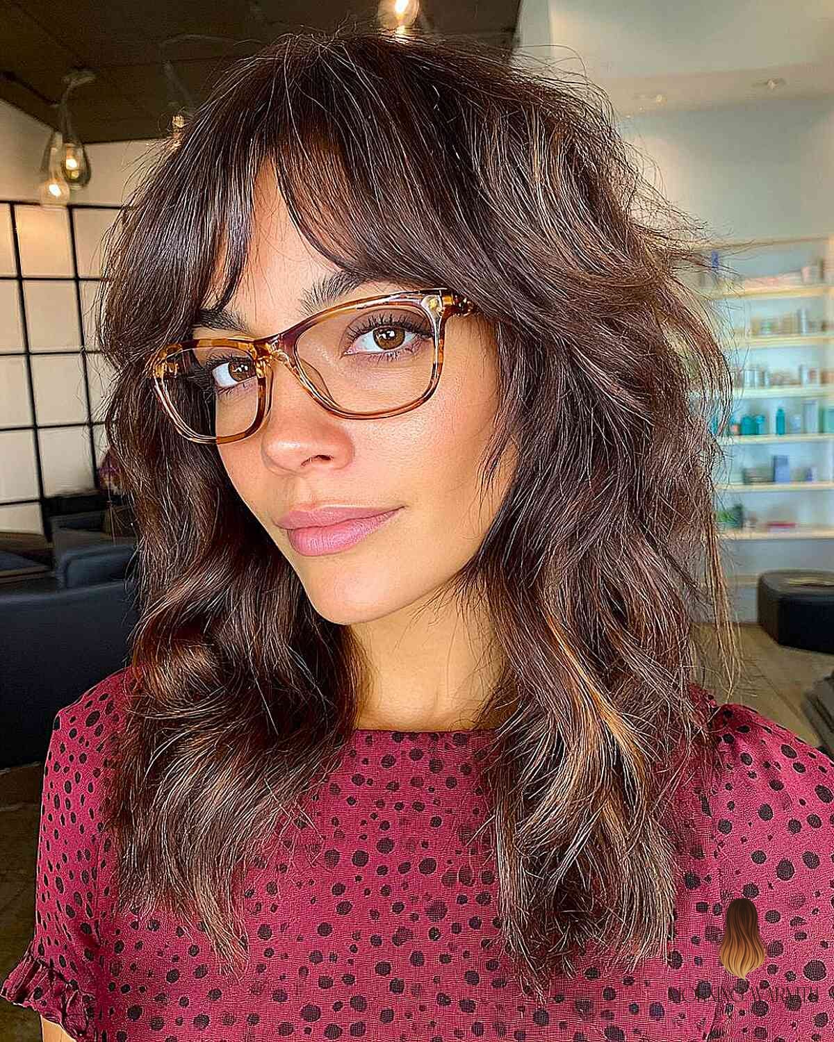 27 Chocolate Hair Color Ideas Every Woman Needs to See 15 Textured Chocolate Brown Waves with Bangs