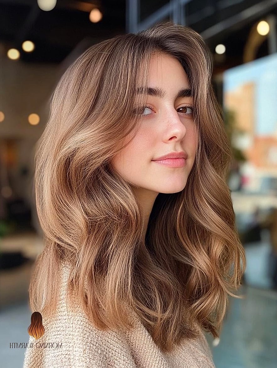 25 Winter Hair Color Ideas That Are Dreamy and So Inspiring 25 Warm Beige Blonde Waves with Soft Movement
