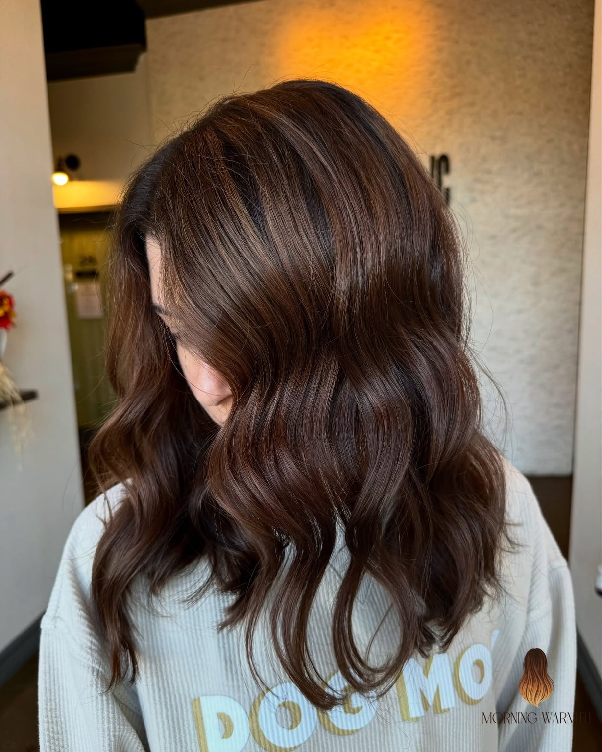 25 Winter Hair Color Ideas That Are Dreamy and So Inspiring 14 Warm Chestnut Waves with Subtle Highlights
