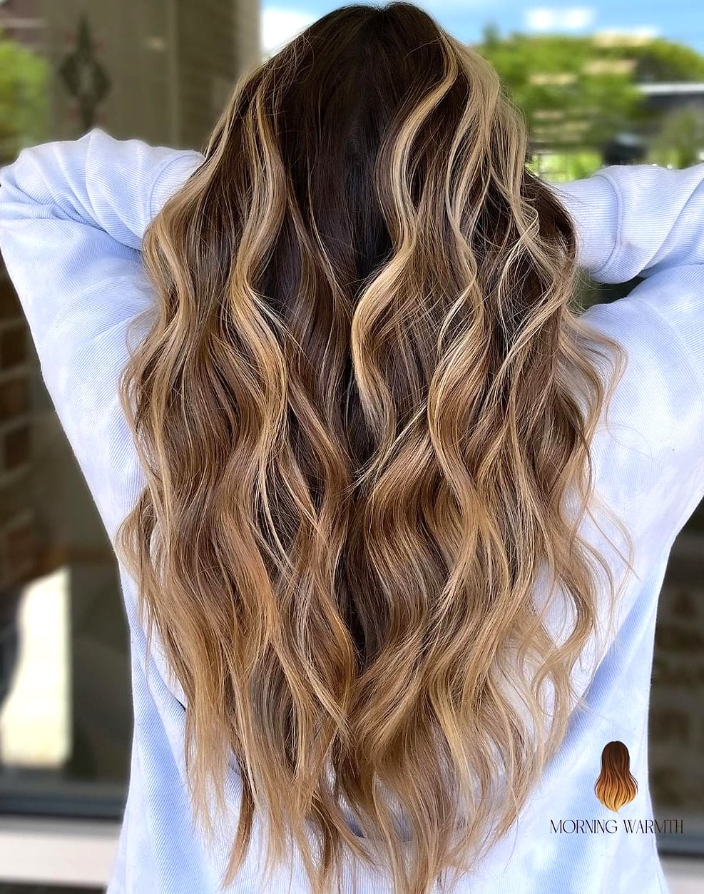 27 Blonde Hair Color Ideas Every Woman Needs to See 26 Wavy Dark Blonde Long Layered Cut