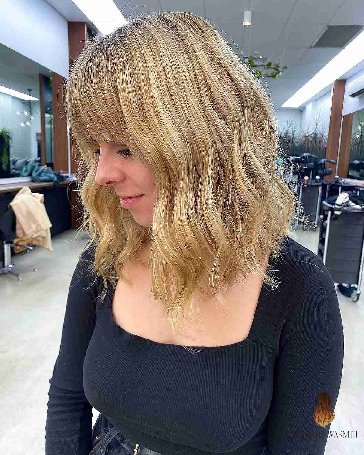 23 Dark Hair Color Ideas Inspo Ideas Worth Pinning Immediately 6 Wavy Lob with Bangs